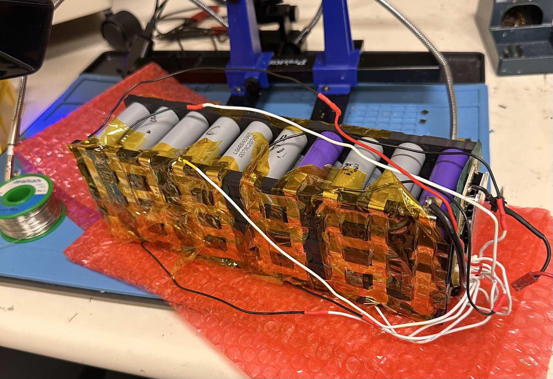 BMS wiring soldered onto the e-bike battery pack